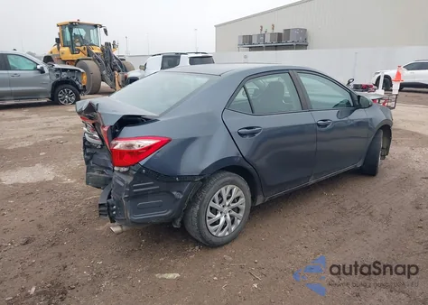 2018 Toyota Corolla Le z USA, uszkodzony, nr VIN 5YFBURHE5JP818641